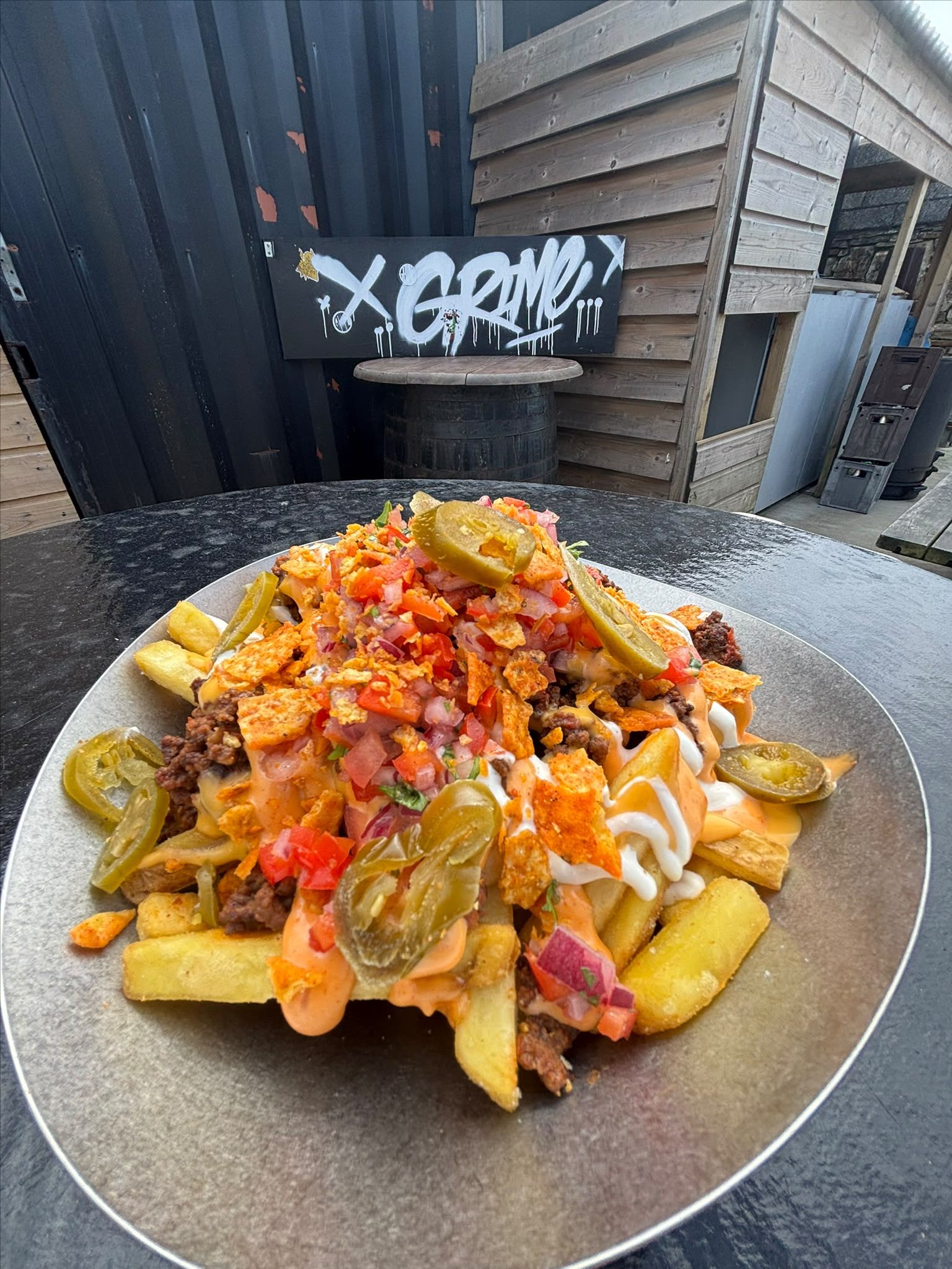 Loaded fries at Grime Street Food with beef, cheese, salsa and jalapeños